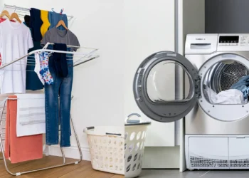 Heated clothes airer beside a tumble dryer comparing UK laundry drying costs